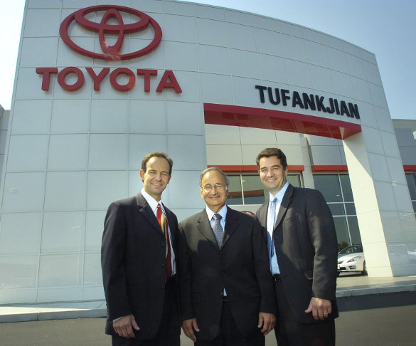 Dealership Owners Pictured Outside Toyota of Braintree