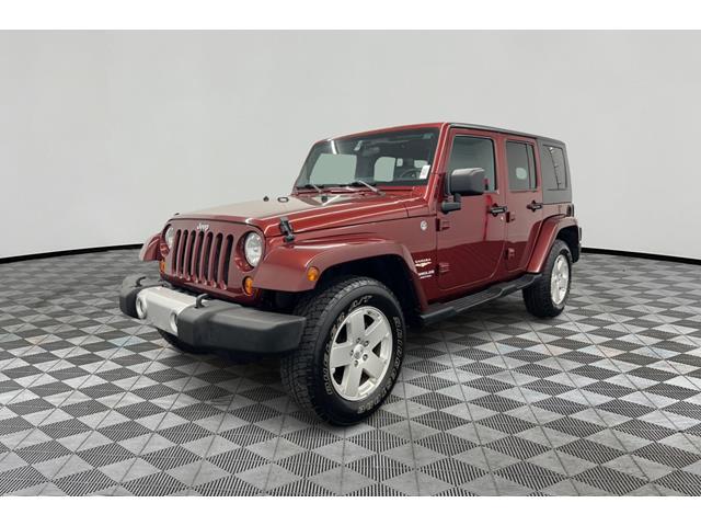 Red Rock Crystal Pearl 2010 Jeep Wrangler Unlimited Sahara 4WD SUV / Crossover Four-Wheel Drive 4-Speed Automatic